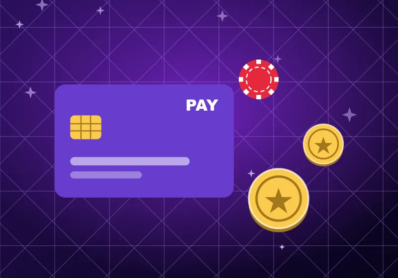 Payment card with coins and a casino chip on purple Payment card with coins and a casino chip on purple